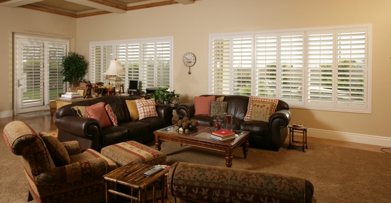 Hartford sunroom with polywood shutters.